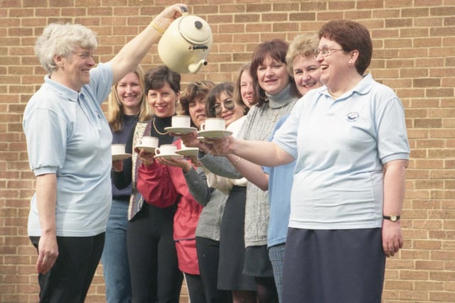 Maureen Batty pours Liz Atkinson a cuppa in 1998, watched by fellow members of the parents' group committee of Seaburn Dene Primary School. The group was the highest money-spinner in the region in the Britain's Biggest D Party, sponsored by Brooke Bond D.