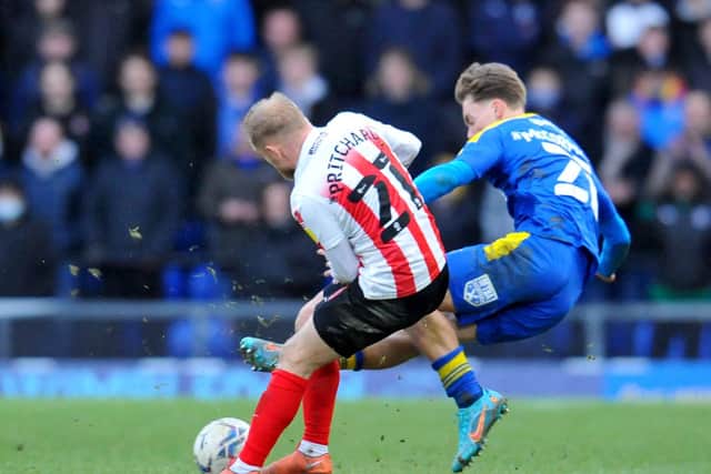 Alex Pritchard playing against AFC Wimbledon. Picture by FRANK REID