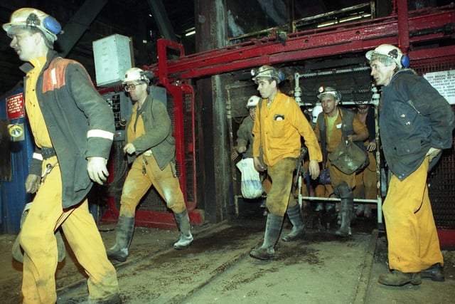 December 1993 and workers leave the cages at Wearmouth Colliery.