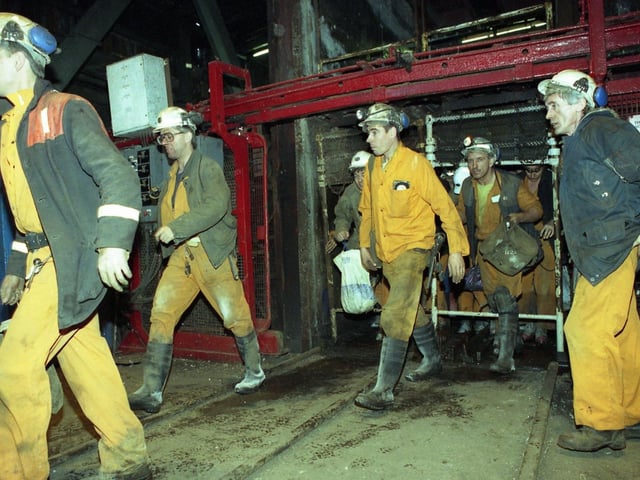 December 1993 and workers leave the cages at Wearmouth Colliery.