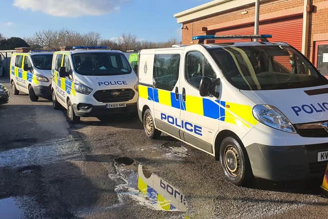 The teenagers cleaned police vehicles after throwing mud at a passing police van.