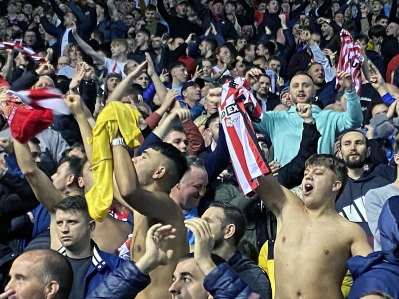 Passionate Sunderland fans cheer the Black Cats on away from home at Birmingham City.