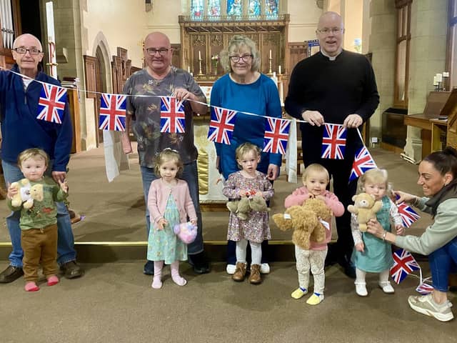 Reverend Paul Barker, Rector of the Boldons, with the Little Angels Toddler Group getting ready for the Royal Teddy Bears Picnic at St Nicholas Church.
