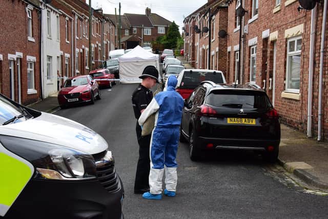 Police forensic officers survey the scene in Melville Street in Chester-le-Street.