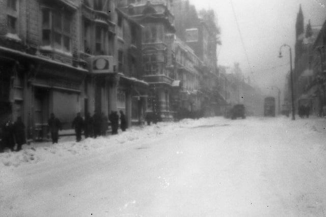 Sunderland went 18 days without daylight in 1947. This scene shows people braving a blizzard in Fawcett Street. Hardy souls!