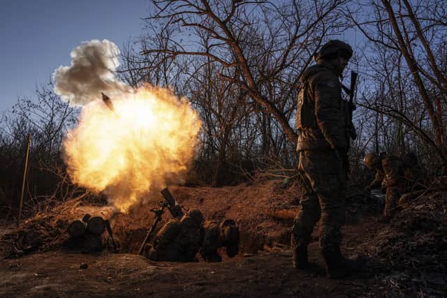 Ukrainian soldiers on the front-line near Bakhmut. 

AP Photo/Evgeniy Maloletka