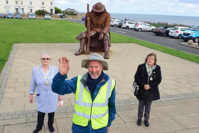 Brian Burnie (centre) fundraiser for Daft as a Brush charity, closing in on completing his 7036 mile walk, next week, by walking from Tommy statue at Seaham to The National Glass Centre, on Saturday. Pictured with Brian are The Mayor and Mayoress of Seaham Coun. Linda Willis (left) and Diane Adamson (right).