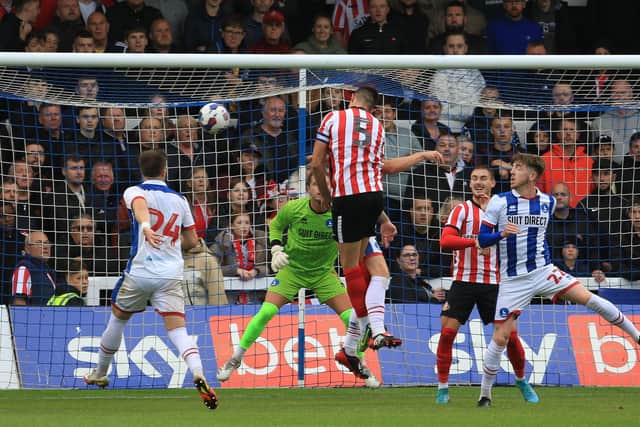 Danny Batth heads wide during Sunderland's pre-season match against Hartlepool.