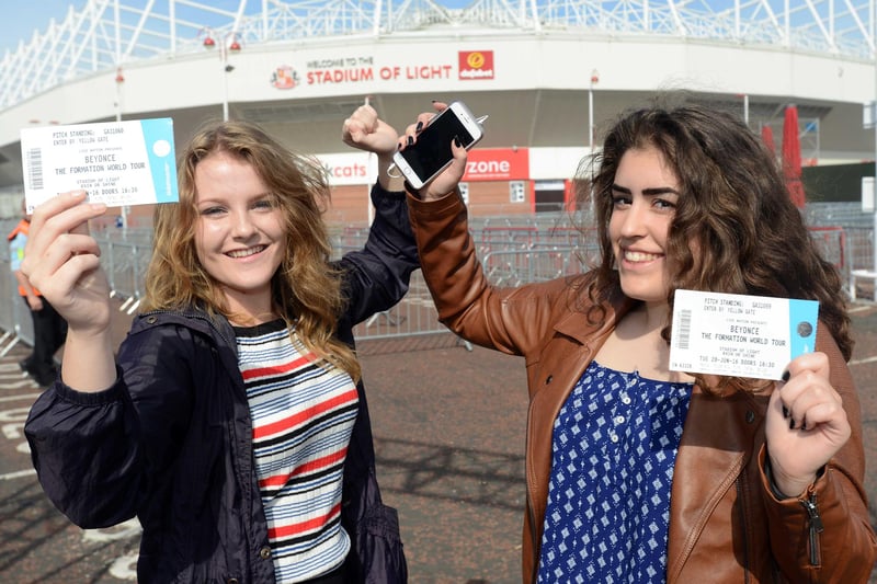 Anna Covell and Holly Ingledew show their tickets as they wait to get into the stadium.