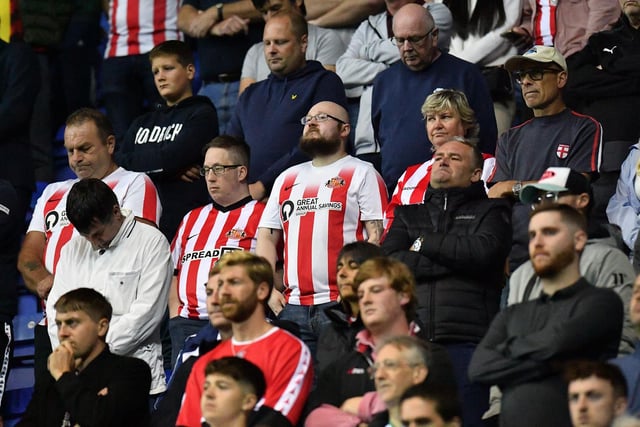 Sunderland players and fans observe silence.