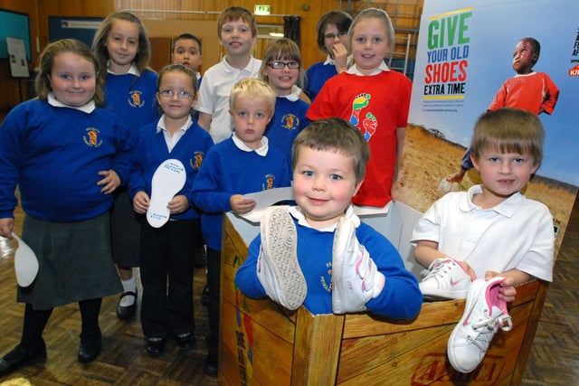 These pupils were collecting shoes for the Shoe Aid For Africa project 12 years ago. Can you spot someone you know?