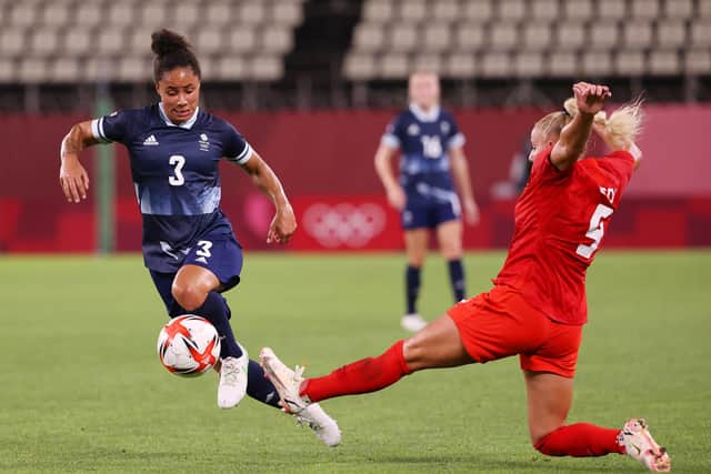 Demi Stokes of Team GB is challenged by Adriana Leon of Team Canada during the Women's Group E match on day four of the Tokyo 2020 Olympic Games at Kashima Stadium on July 27, 2021 in Kashima, Ibaraki, Japan. (Photo by Atsushi Tomura/Getty Images)