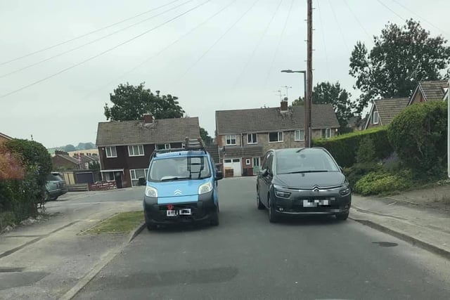 After being asked to move to allow a delivery driver through, the driver of the grey car moved their vehicle, only to immediately put it back in the exact same spot afterwards.