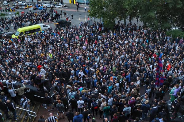 Newcastle United fans celebrate the takeover. North News.