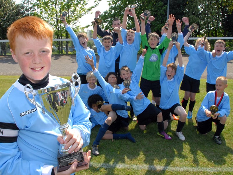 Captain Trey Foster (12) with the Rainworth Rangers team celebrate after winning 2-1 against Glapwell Gladiators in their Under 12 Division 2 final.