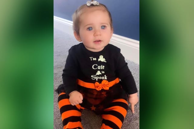 Molly, 8 months, is definitely 'too cute to spook' on Halloween.