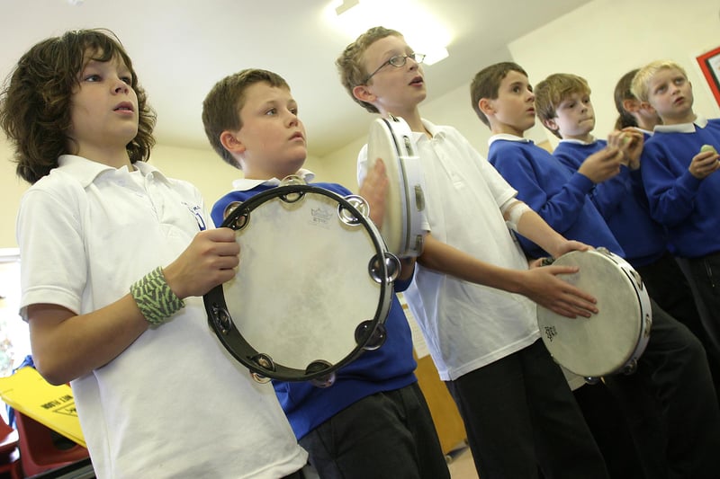 Year six at St Mary's Primary School practise their drumming skills in preparation for the lantern procession that marked the climax of the New Mills Festival