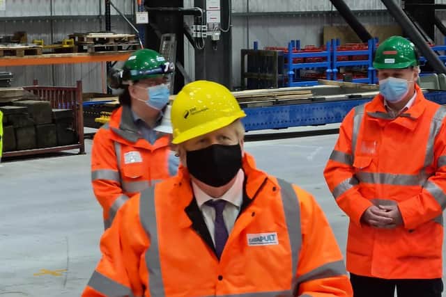 Prime Minister Boris Johnson pictured during a visit to the National Renewable Energy Centre in Blyth, Northumberland, on Friday, where he pledged to make the decision over the North East's Tier 3 status "fair".