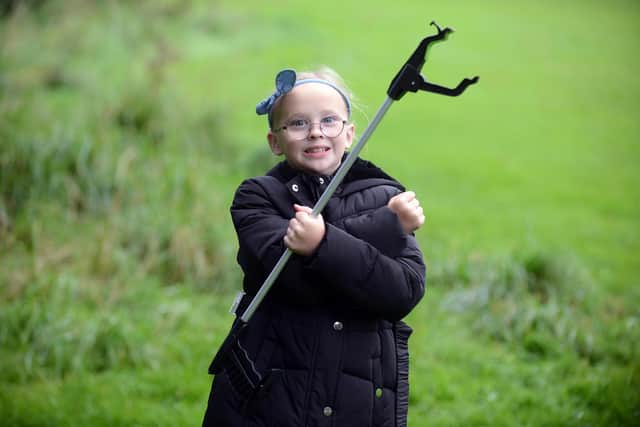 Lucy McCormick, nine, sees litter picking in King George Park as a call to Arms. Sunderland Echo image.