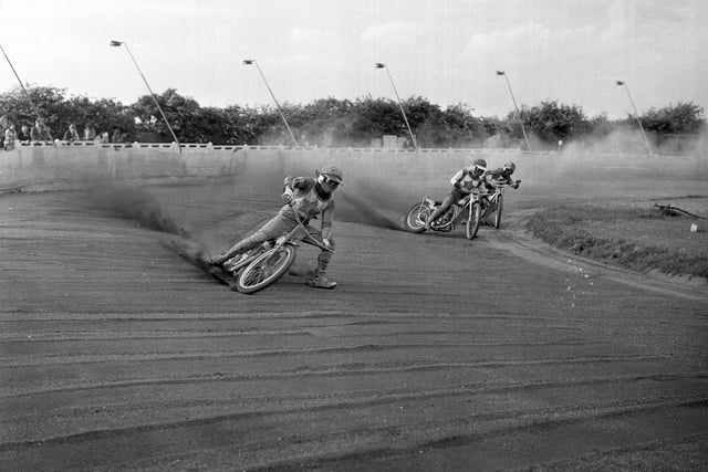 Riders jockeying for position in a heat of the Knock Out Cup Round 1, second leg, between Sunderland and Teesside at Newcastle Road speedway track in June 1973.