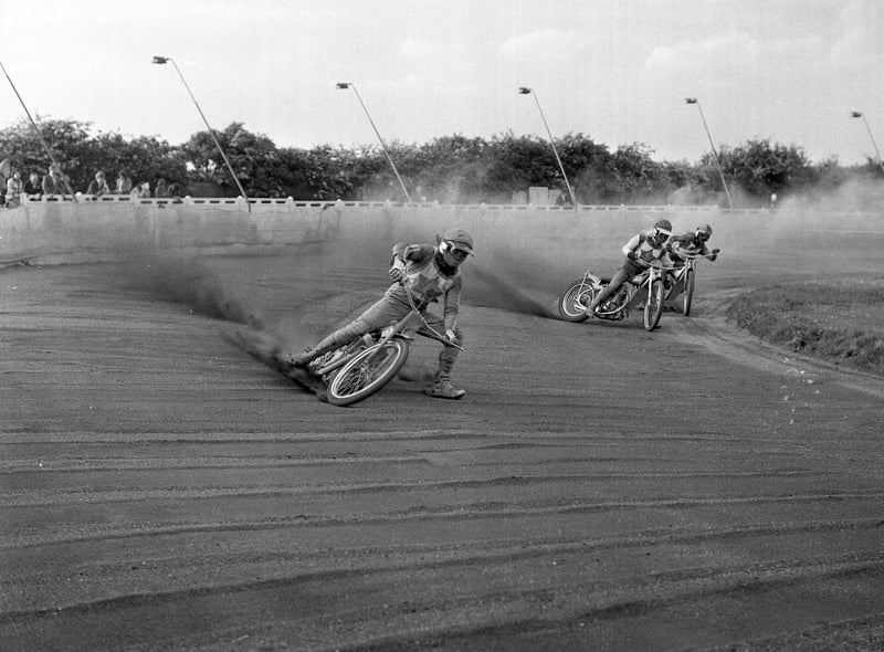 Riders jockeying for position in a heat of the Knock Out Cup Round 1, second leg, between Sunderland and Teesside at Newcastle Road speedway track in June 1973.