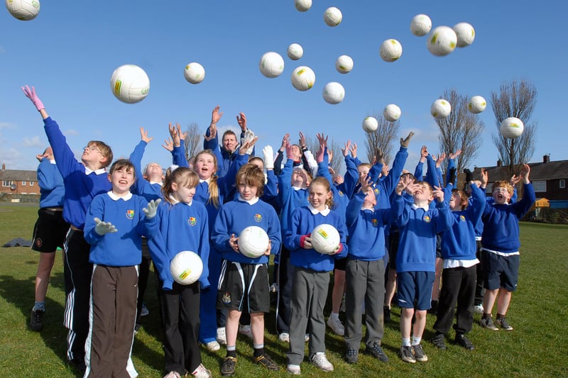 Pupils got to grips with Gaelic football in this 2008 scene. Who do you recognise in the photo?
