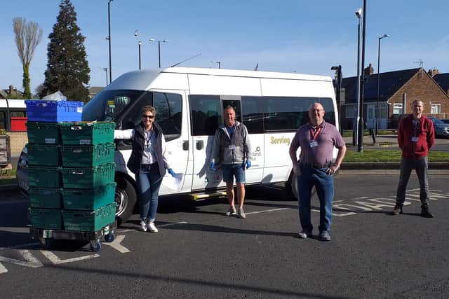 Catherine,Dave,Leslie and Neil leaving Tesco to deliver shopping.