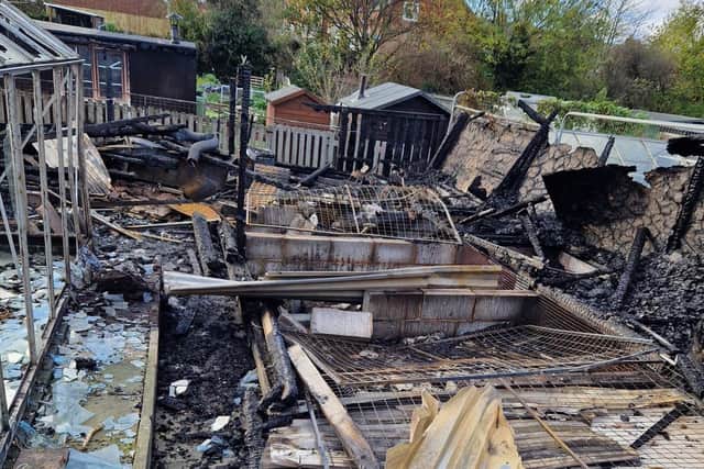 The remains of the allotment following the fire on Friday.