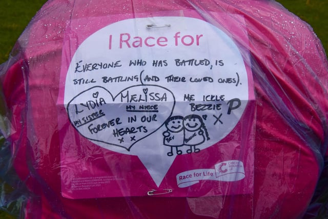 A runner's personalised sign at the Race for Life on Sunday, May 29.
