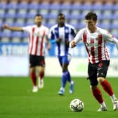 WIGAN, ENGLAND - SEPTEMBER 21: Nathan Broadhead of Sunderland controls the ball during the Carabao Cup Third Round match between Wigan Athletic and Sunderland at DW Stadium on September 21, 2021 in Wigan, England. (Photo by Jan Kruger/Getty Images)