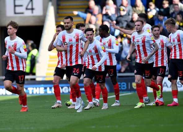 Sunderland players celebrate after scoring at Oxford United. Picture by FRANK REID