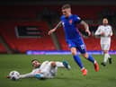 Kieran Trippier of England is challenged by Luca Ceccaroli of San Marino during the FIFA World Cup 2022 Qatar qualifying match between England and San Marino at Wembley Stadium on March 25, 2021 in London, England.  (Photo by Adam Davy - Pool/Getty Images)