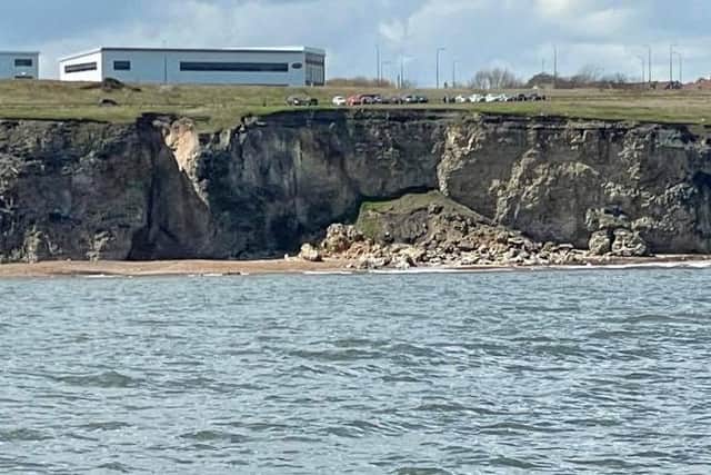 Pictures shows aftermath of cliff collapse at Chemical Beach