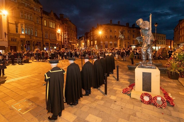 Durham City's Market Square falls silent during the observation of last night's (September 18) minutes silence in memory of Queen Elizabeth II.