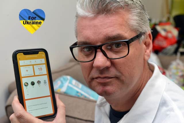 ExCommunicate Managing Director, Paul Briggs, with the company's new Ukraine Free Family Tool app.