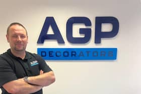 Managing Director Paul Mullaney pictured next to AGP Decorator's new logo