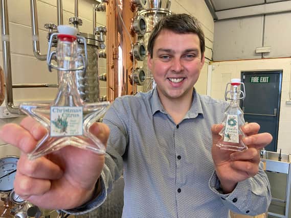 Scott Wilson-Laing with the WL Distillery festive gins