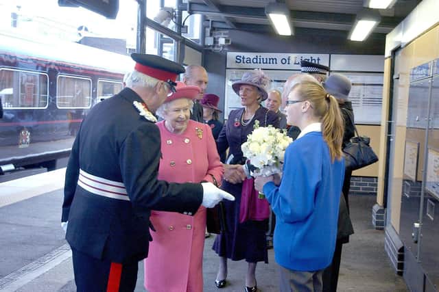 Such a special moment for Lois as she meets the Queen and hands her a posy of flowers.