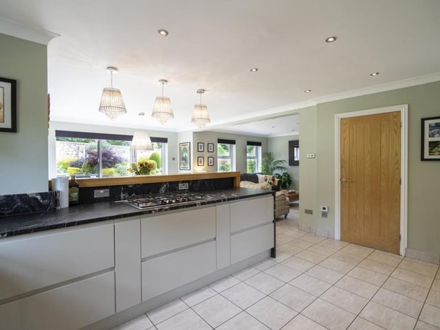 The kitchen has two sets of Bi folding door opening to the rear garden and opening to the living area.