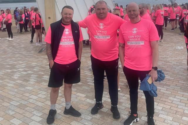 Staff and residents at Swan Lodge take part in a charity walk