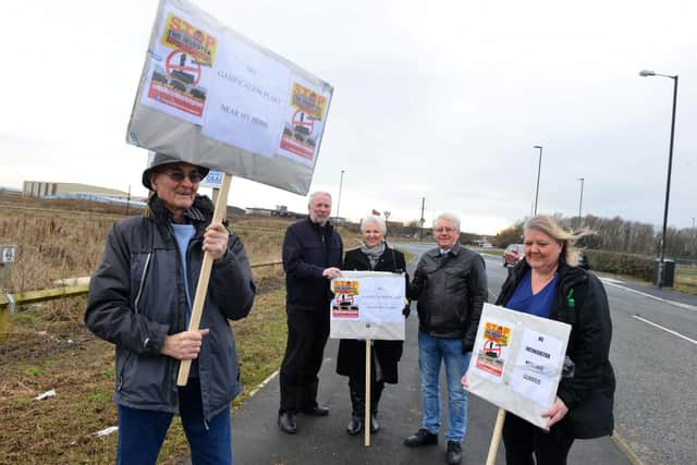 Protestors at the site (from left) David Tatters, Paul Gibson, Jen Loader, George Sanderson and Tracey Young