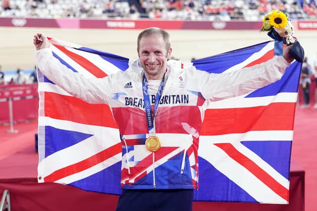 Great Britain's Jason Kenny celebrates with the gold medal in the Men's Keirin Finals to become the first Team GB athlete to win seven Olympic Gold Medals. Picture: PA.