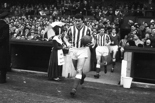 'The greatest centre half the world has ever seen' Charlie Hurley leads out Sunderland at Roker Park.