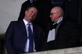 Mike Ashley owner of Newcastle United talks to Managing Directory Lee Charnley. (Photo by Catherine Ivill/Getty Images)