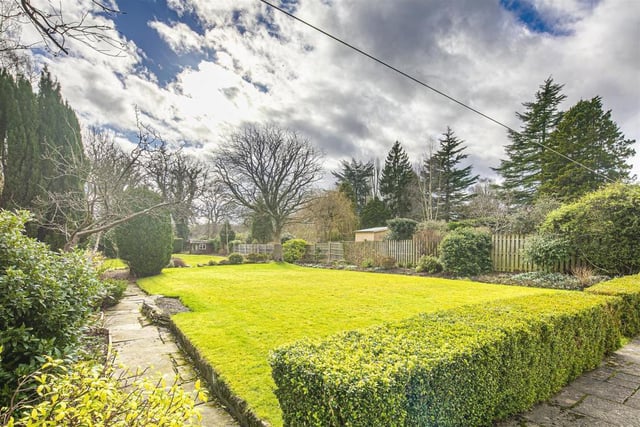 The property has a beautiful, south facing gardens to the rear, says the brochure..