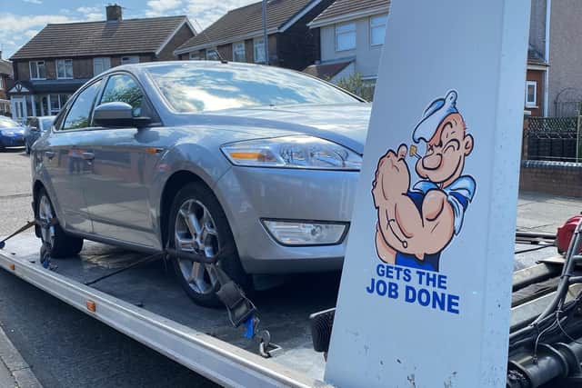 Popeye gives a thumbs up following the seizure of a car as part of flytipping investigation.
