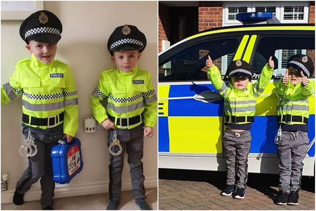 Little police officers Levi, five, and Ellis, three.