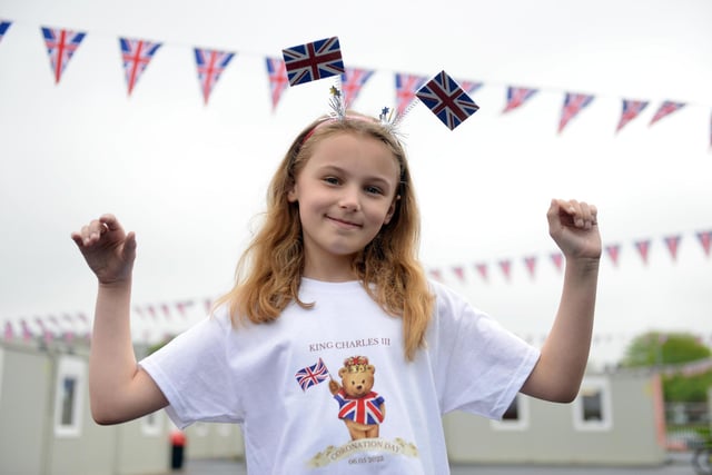 Burnside Academy pupil Olivia Laing, 8, is dressed to show her support for the new king.