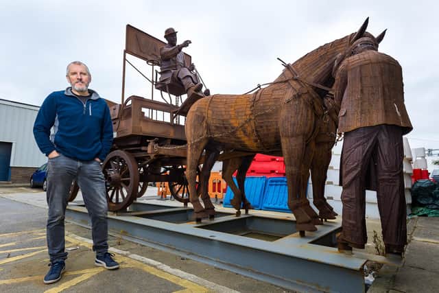 Artist Ray Lonsdale with his metal sculpture Gan Canny.