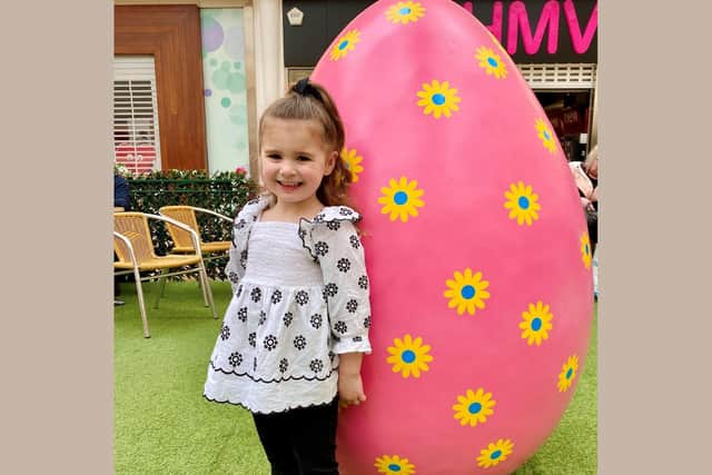 Little Bridges shopper, Sienna with the Easter colouring page and the giant Easter Egg.